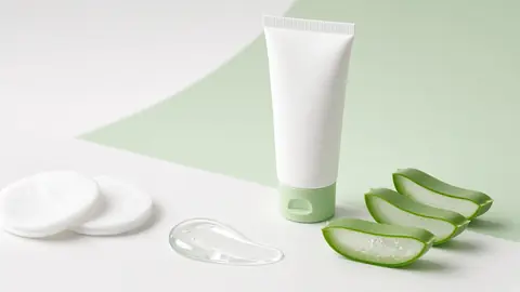 Anti-acne gel and cream tubes with fresh skincare styling (illustrative)