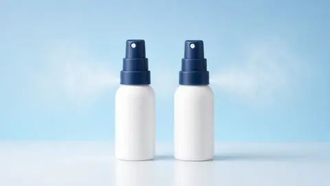 Nasal spray bottles on a clean pharmaceutical background (illustrative)